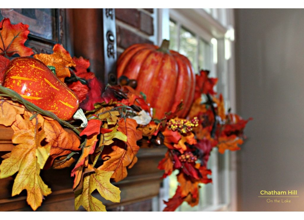 Flowing Garland and Tilted Pumpkins on the Fireplace Mantle